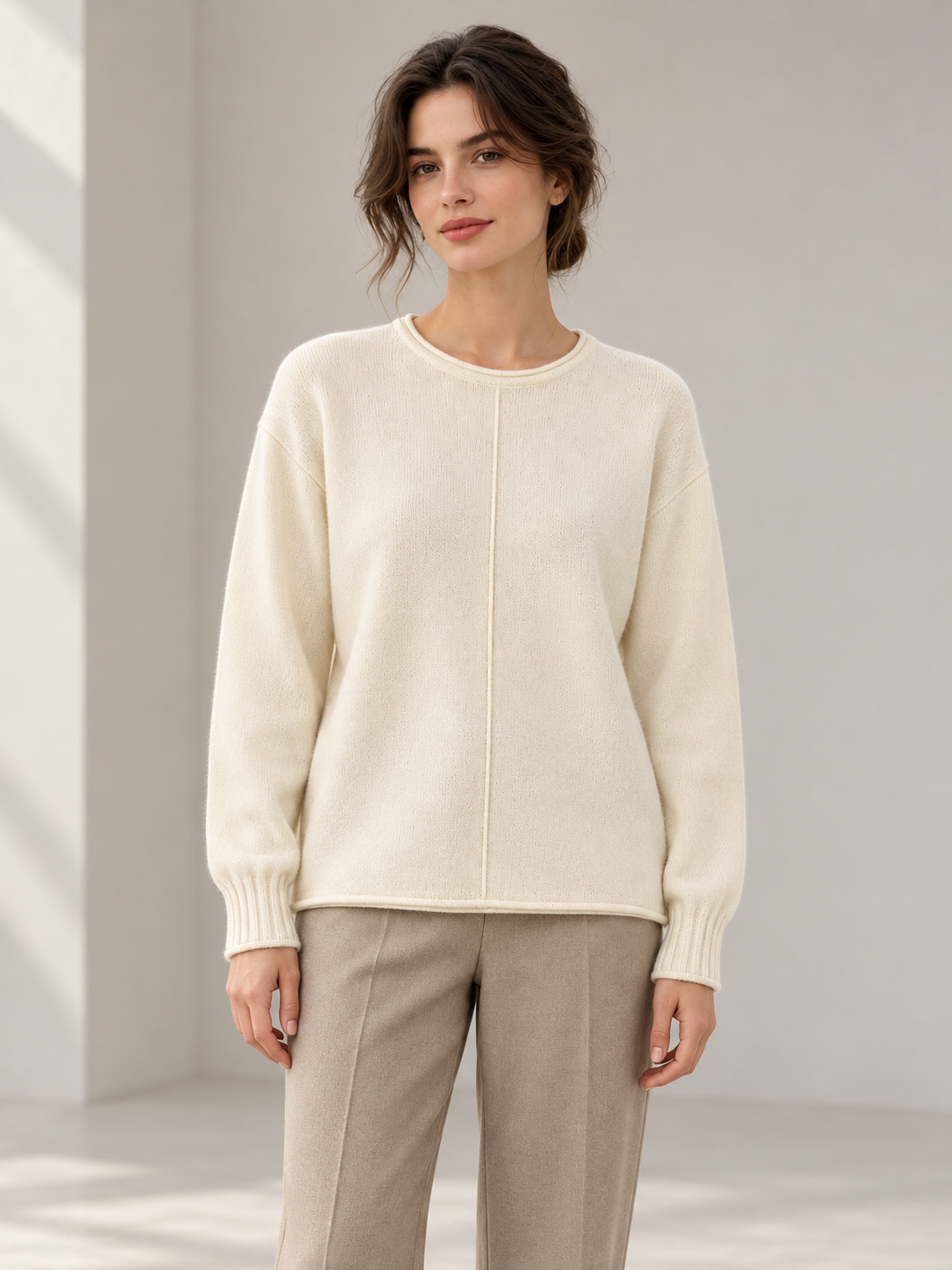 Roll-Edge Knit Sweater in White — model front