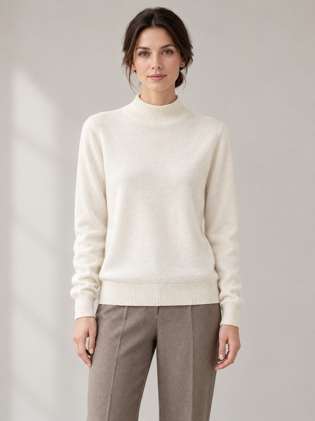 Solid Mock-Neck Sweater in White — model front