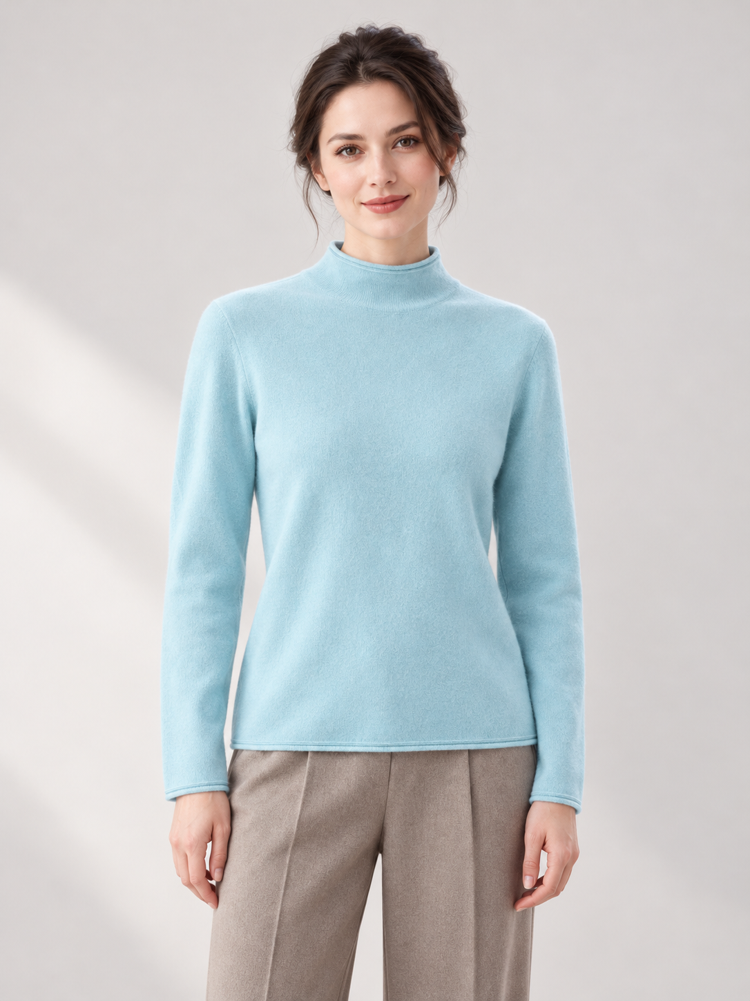 Roll-Edge Mock-Neck Sweater in Lake Blue — model front