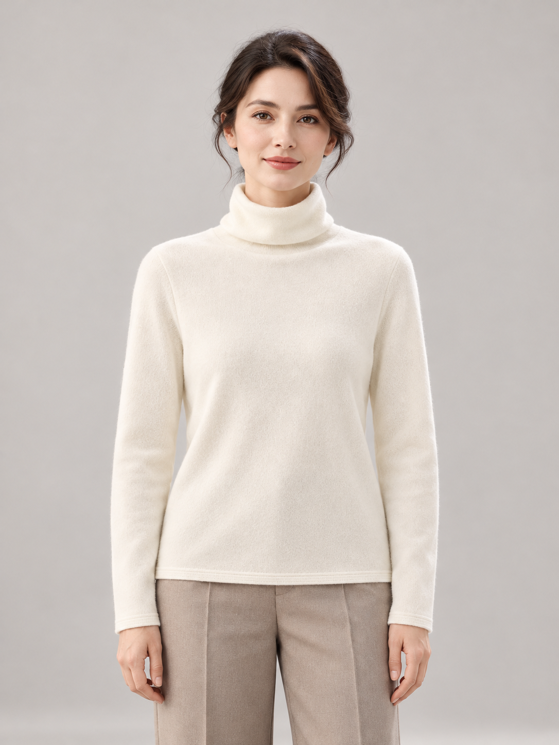 Roll-Edge Turtleneck Sweater in White — model front