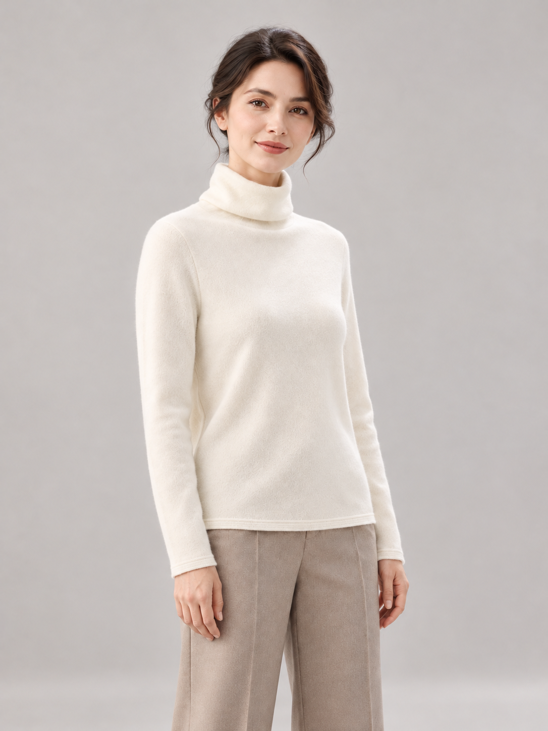 Roll-Edge Turtleneck Sweater in White — model threequarter